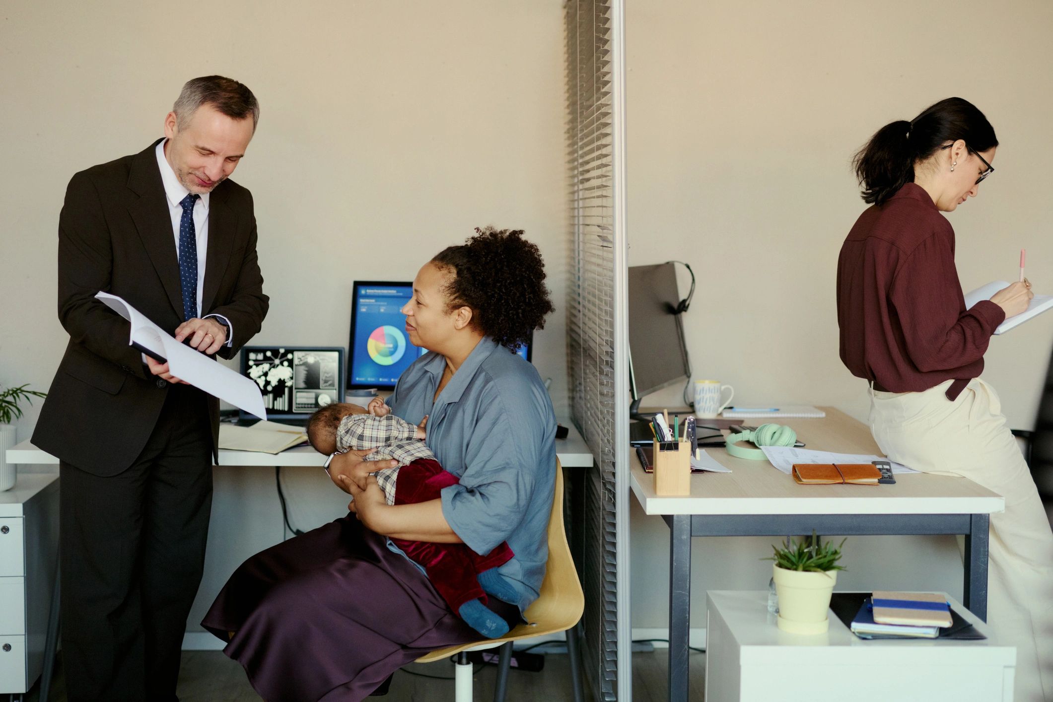 Business owner meeting with a funding advisor in an office
